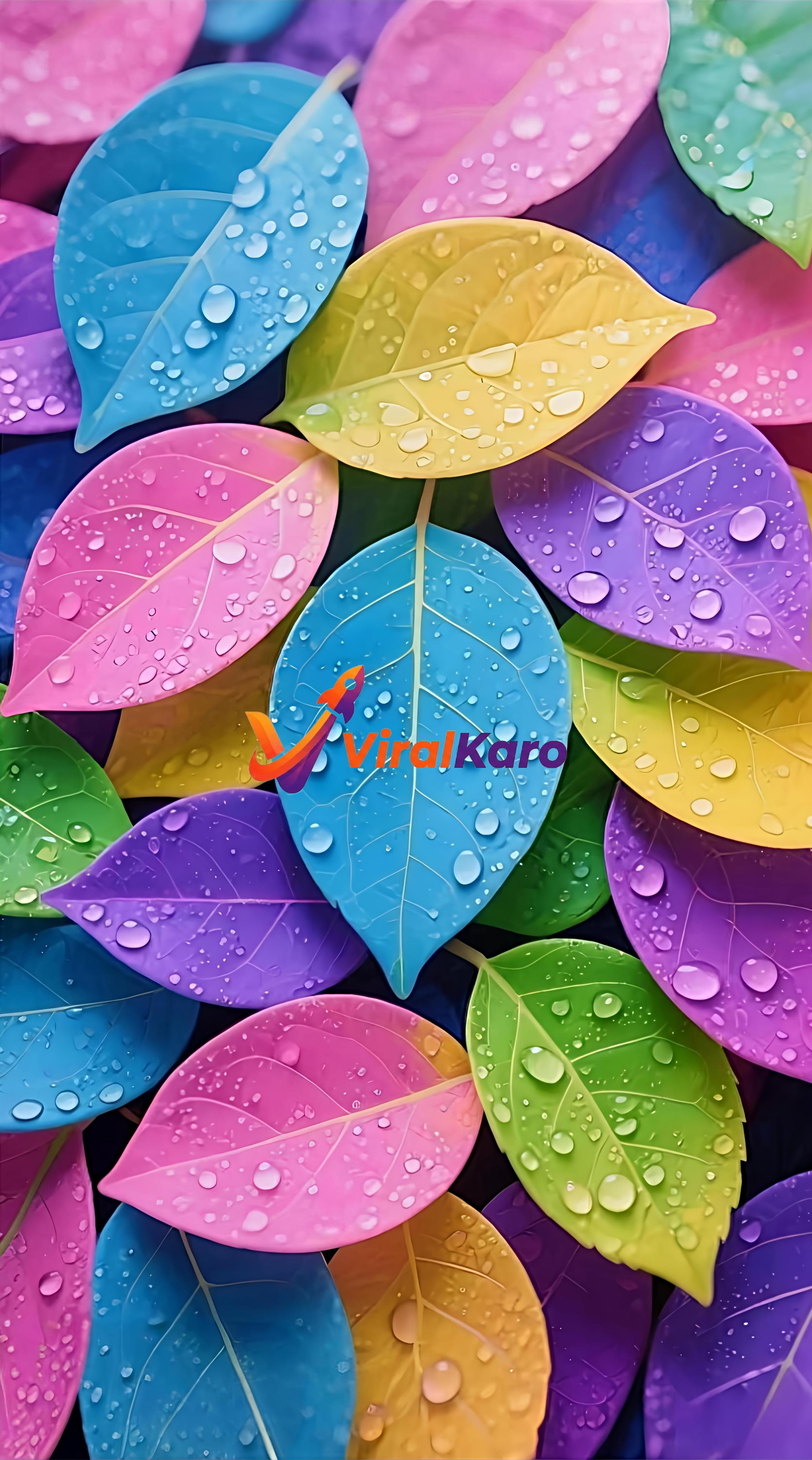 A close-up high-resolution image featuring a vibrant collection of rainbow-colored leaves including blue, pink, yellow, purple, and green, all covered in clear water droplets.