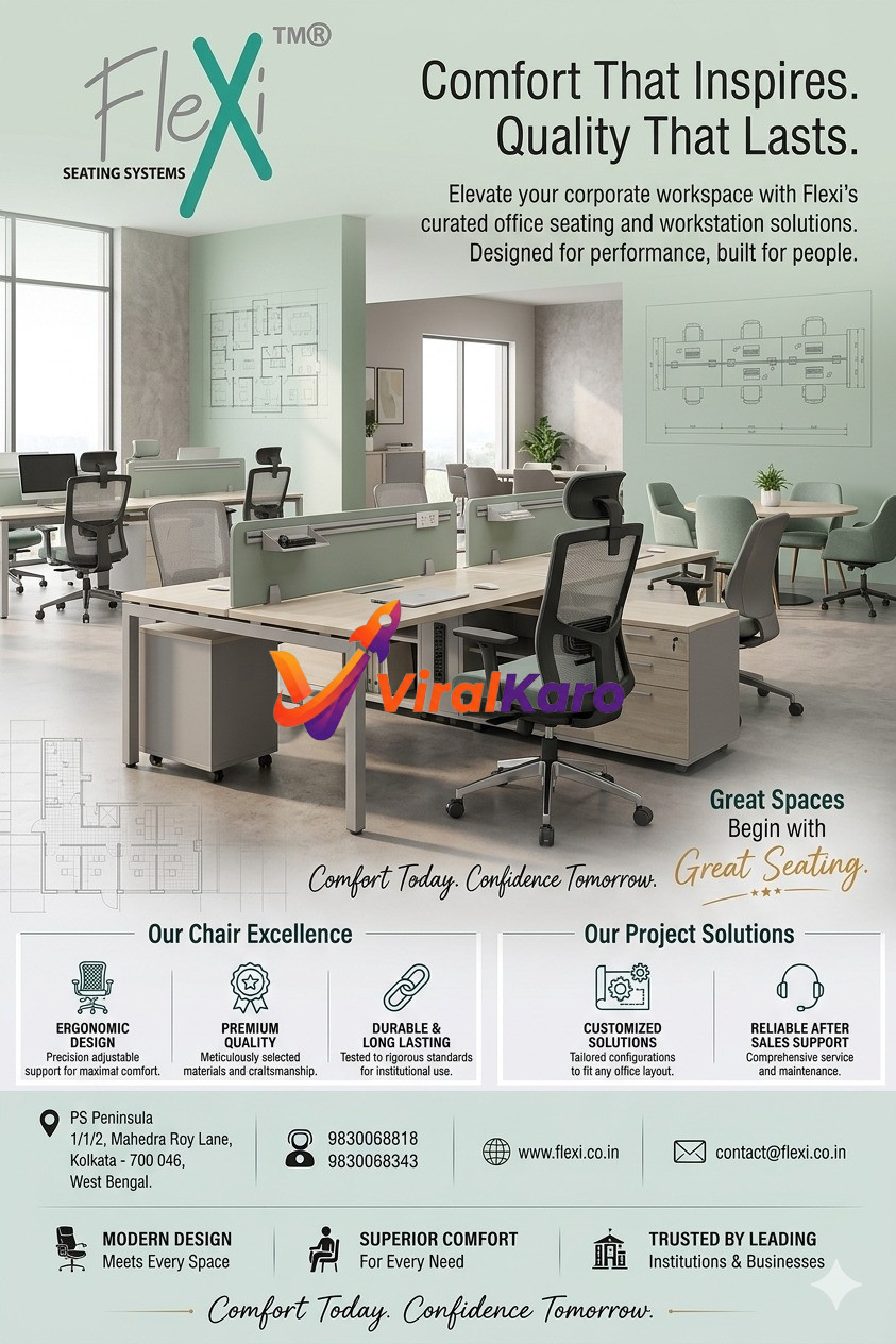 A modern open-plan office featuring Flexi ergonomic grey and green office chairs, light wood desks with integrated privacy panels, and contemporary workstations. The brightly lit space includes a collaborative area with a round table and upholstered chairs, large windows, and a clean, professional aesthetic promoting comfort and productivity.
