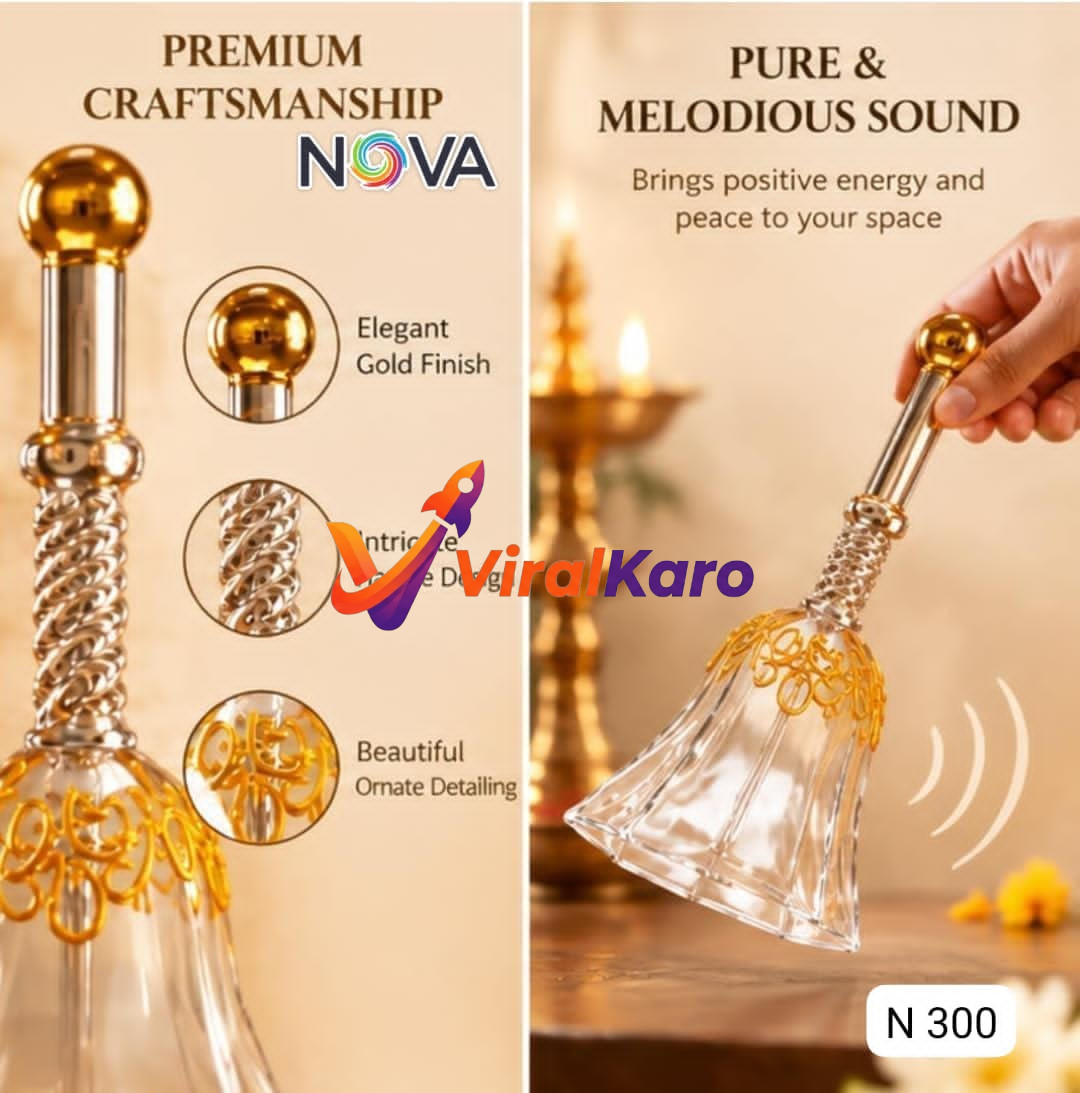 A close-up product photograph of a Nova brand decorative glass and gold metal hand bell with an intricate handle and ornate detailing, set against a blurred background of a traditional Indian diya lamp.