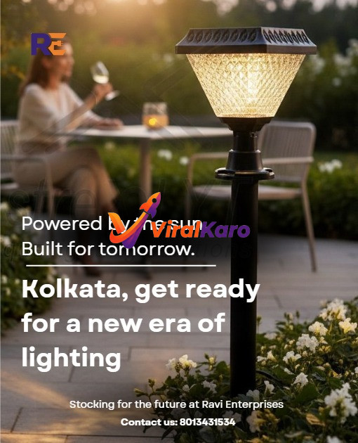 A modern, stylish solar-powered garden lamp glowing in a backyard setting with a blurred background of a person sitting at a table.