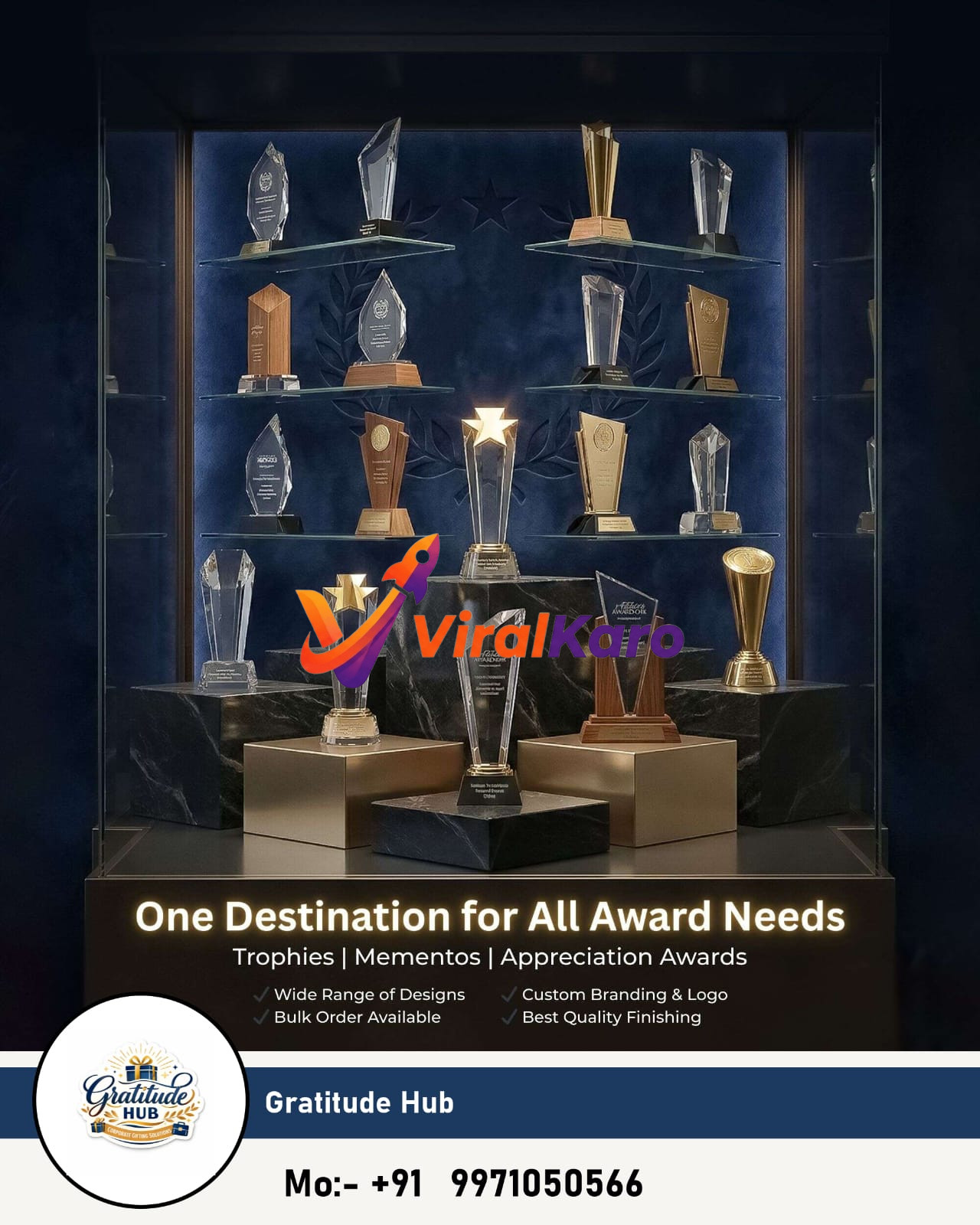 A sleek display cabinet showcasing a diverse collection of custom trophies and awards by Gratitude Hub. The awards feature various designs, including clear crystal awards with pointed tops, rectangular wooden plaques, and golden-colored cups. Some trophies have star accents and intricate engravings. The background is a dark blue, accentuating the elegance of the awards, and the company's logo and contact number are visible at the bottom.